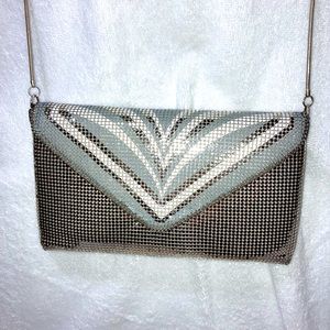 Silver colored mesh look evening clutch purse with strap